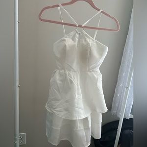 Cute dress for summer. Brand new, never wear. White color, have push up bra.